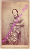 Carte de Visite of woman leaning on floral chair